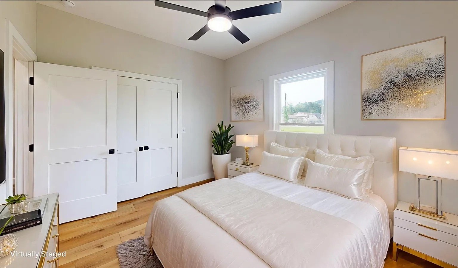 Navy Lane Virtually staged bedroom with white bedding and warm wood floors